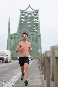 Runner coming over the North Bend Bridge.