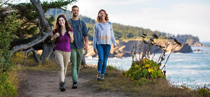 Oregon Coast Trail - Hikers near Shore Acres State Park