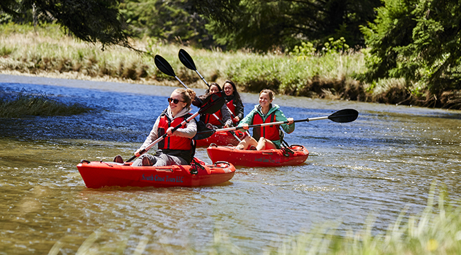 Kayaking in the South Slough on a sunny day.