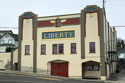 liberty theater building with red front doors