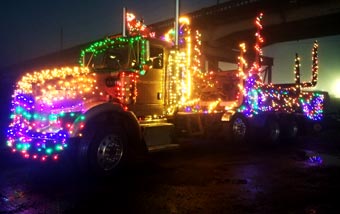 Trucks of all sizes cruise through North Bend for the holidays!