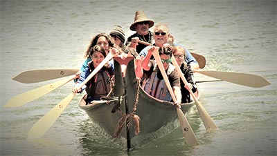 The Coquilles Rowing on Bay